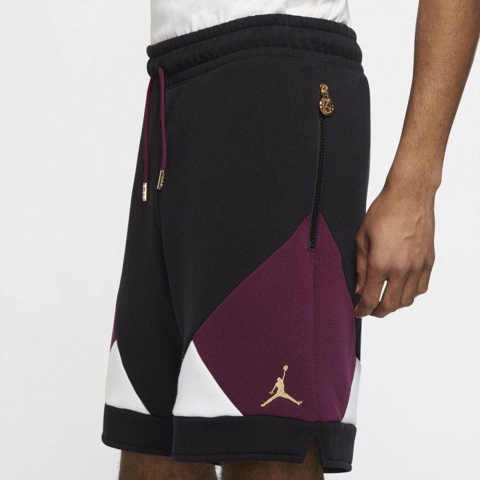 black and gold jordan shorts